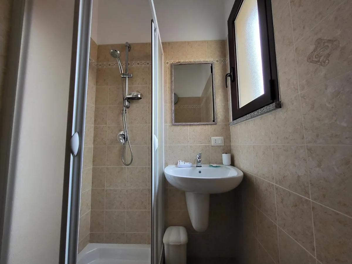Guest house White Sand Affittacamere La Caletta Italy